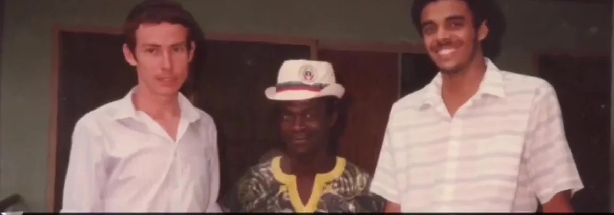 Two medical students, Stanley Jones and Dag Heward-Mills, with a local man in Suhum, Ghana, in 1988.